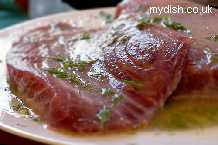 Pan Seared Tuna, Vine Roasted Tomatoes, Herb & Chilli Tagliatelli and A White Wine and Caper Sauce