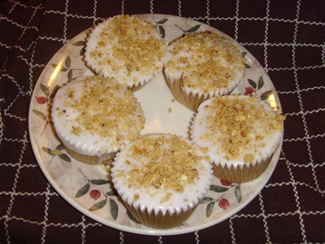 Almond Frosted Cupcakes with Crushed Almonds & Walnut Topping