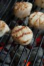 Scallops Wrapped in Parma Ham ,served On Its Own Spit with Chorizo,asparagus and Pea Salad