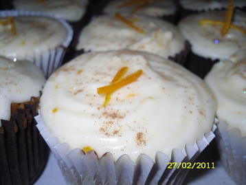 Carrot Cupcakes with Orange Cream Cheese Topping